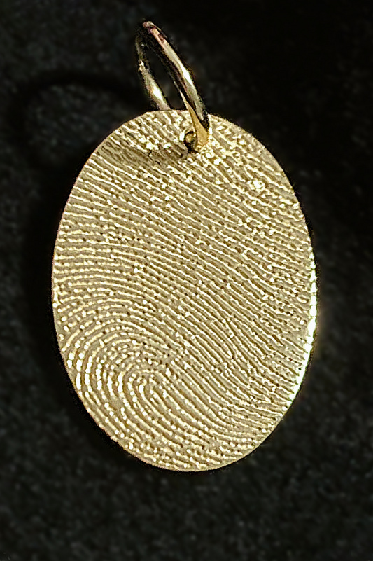 Round Charm in Brass
